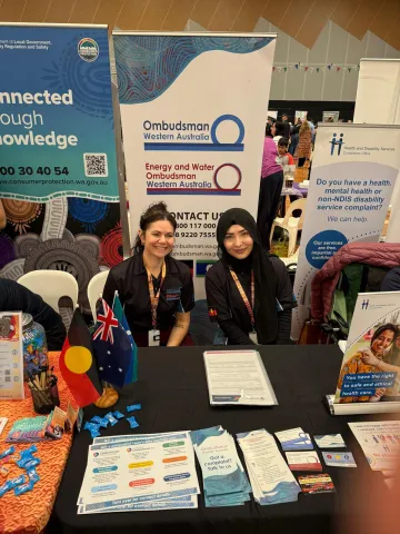 Table and staff at Mirrabooka NAIDOC week event